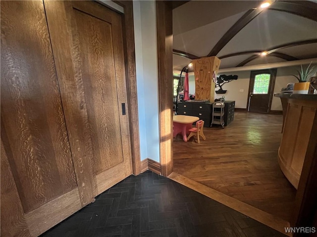 hall with dark parquet floors