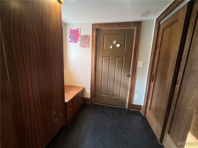 interior space featuring dark parquet floors