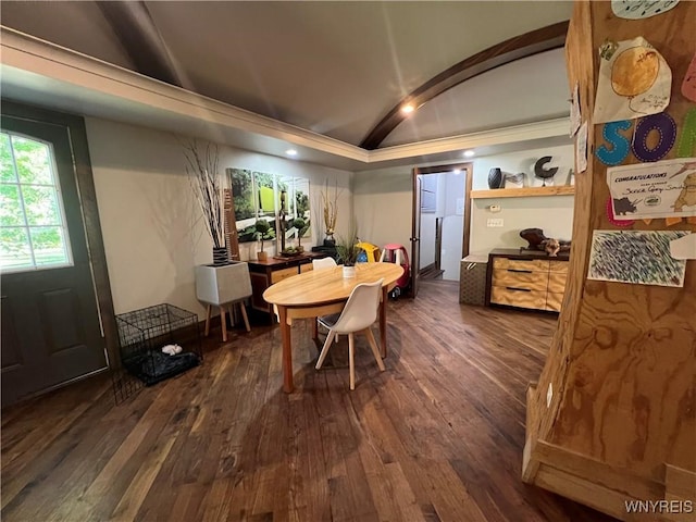 dining space with dark hardwood / wood-style floors and lofted ceiling