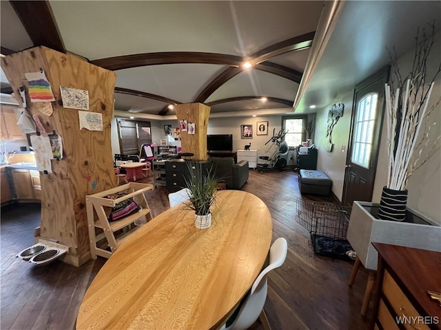 dining area with lofted ceiling and dark wood-type flooring