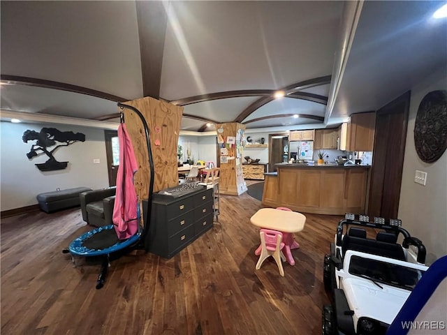 interior space featuring beamed ceiling and wood-type flooring