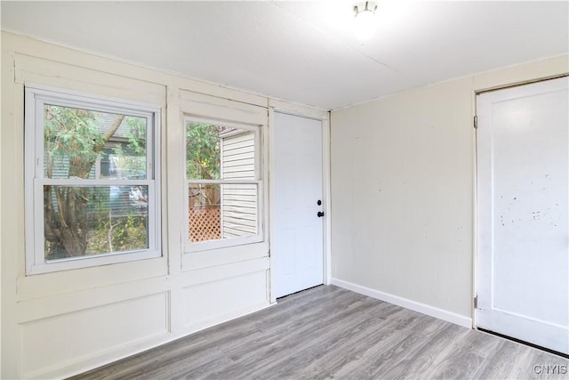 empty room with light wood-type flooring