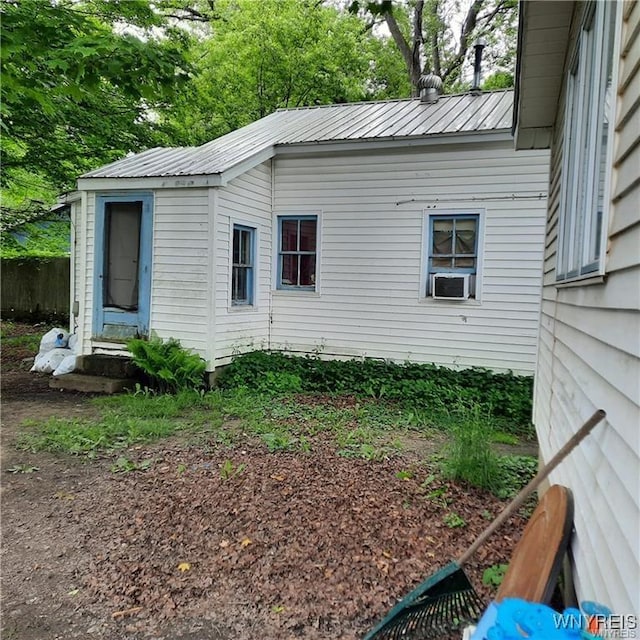 view of side of property featuring cooling unit