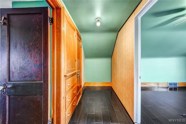 corridor featuring dark hardwood / wood-style flooring