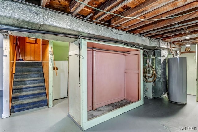 basement with heating unit and water heater