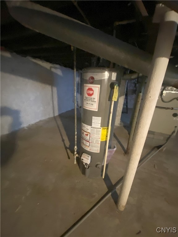 utility room with gas water heater