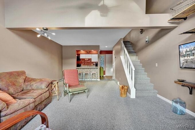 living room with ceiling fan