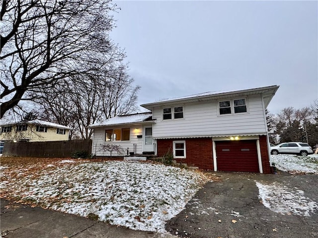 split level home with a garage