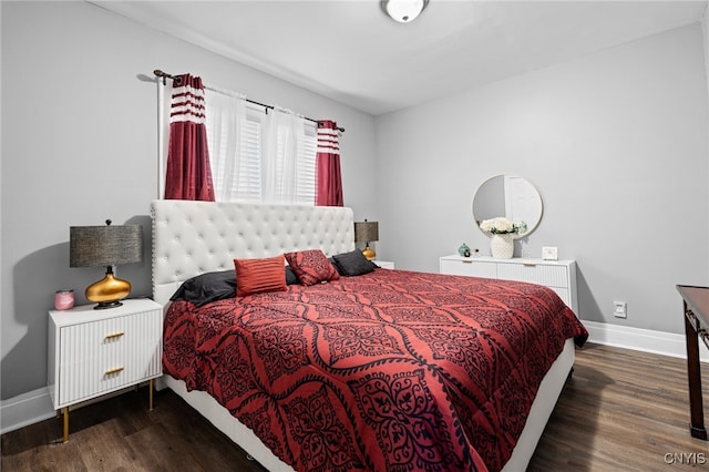 bedroom featuring dark hardwood / wood-style floors