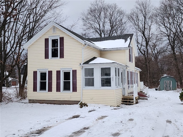 exterior space featuring a shed