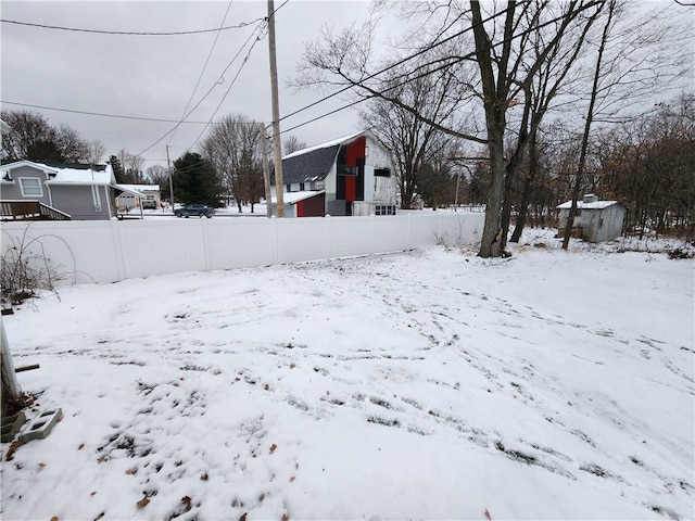 view of yard covered in snow