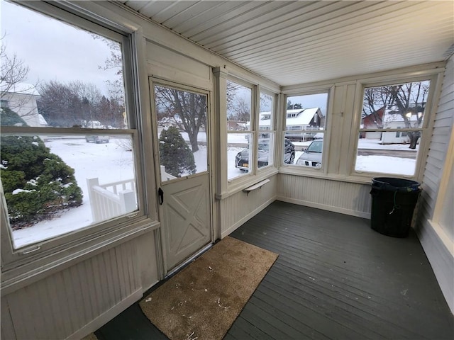 unfurnished sunroom with a wealth of natural light