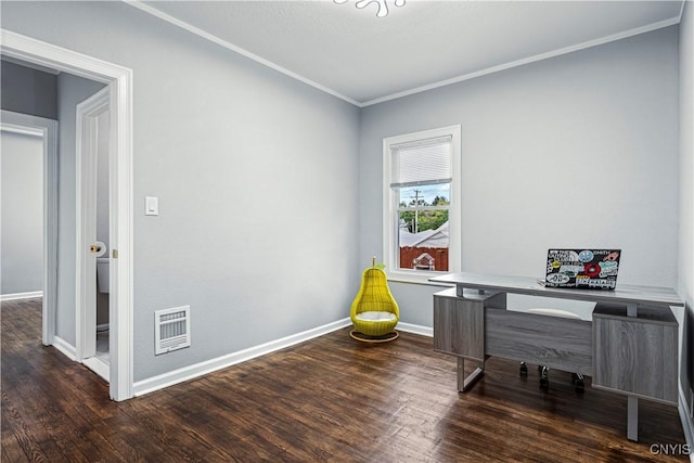 home office with dark hardwood / wood-style floors and ornamental molding