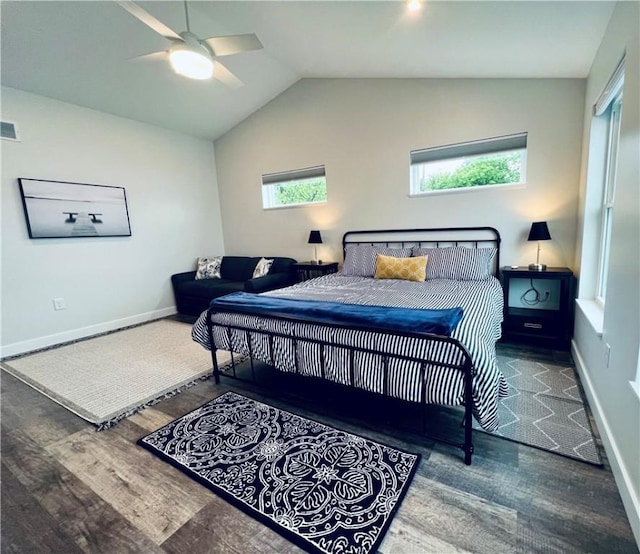 bedroom featuring ceiling fan, hardwood / wood-style floors, and lofted ceiling