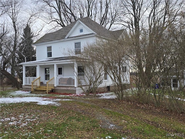 farmhouse-style home featuring covered porch