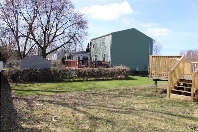 view of yard with a wooden deck