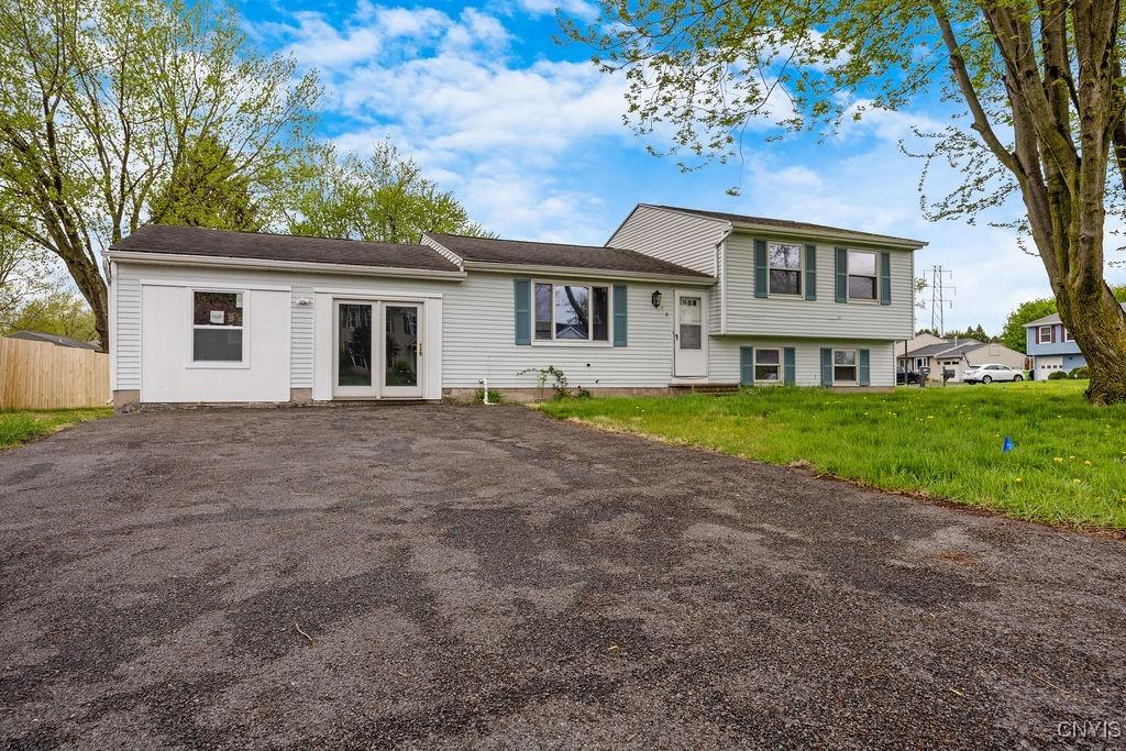 110 Snappy Ln, Salina, NY 13090 - split level home featuring fence, french doors, and driveway