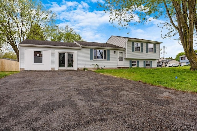 110 Snappy Ln, Salina, NY 13090 - split level home featuring fence, french doors, and driveway