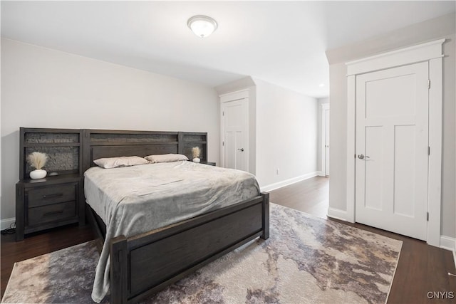 bedroom featuring dark hardwood / wood-style floors