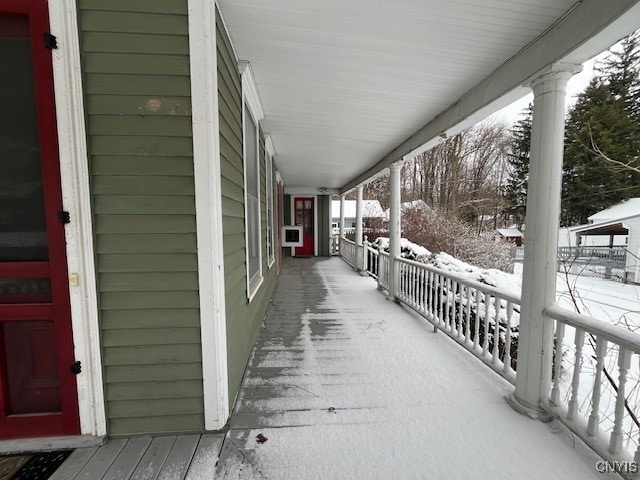 view of snow covered patio