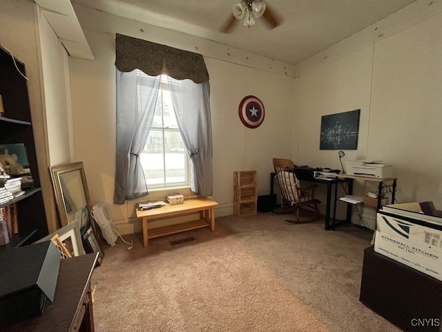 office area featuring carpet flooring and ceiling fan