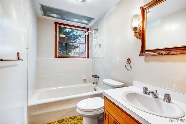 full bathroom featuring vanity, toilet, and tiled shower / bath combo