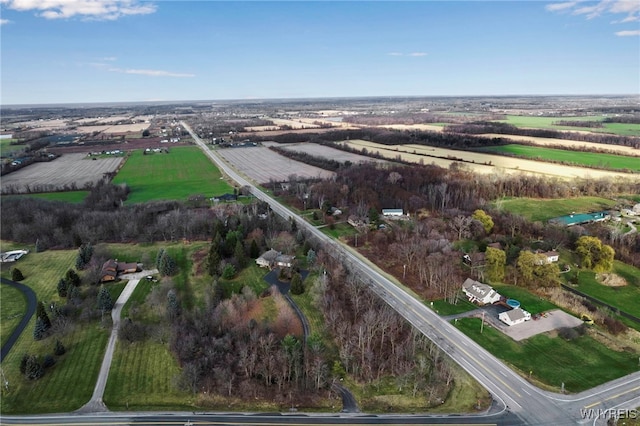 birds eye view of property featuring a rural view