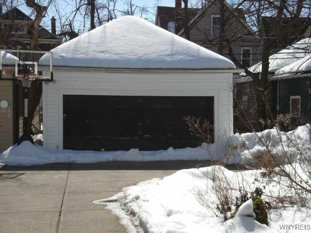 view of snow covered garage