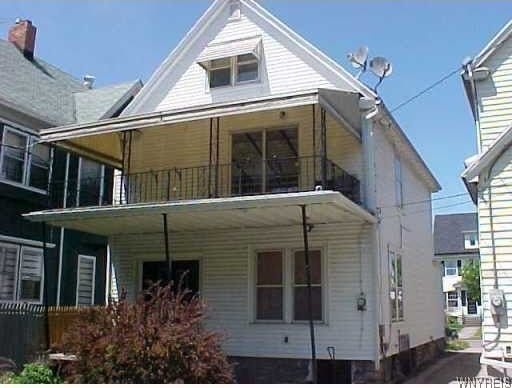 exterior space featuring a balcony and a porch