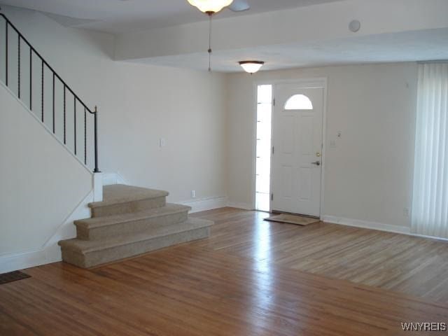 entrance foyer featuring hardwood / wood-style floors