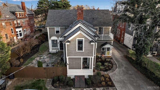 view of front of home with a balcony