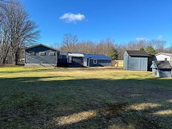 exterior space with a storage shed