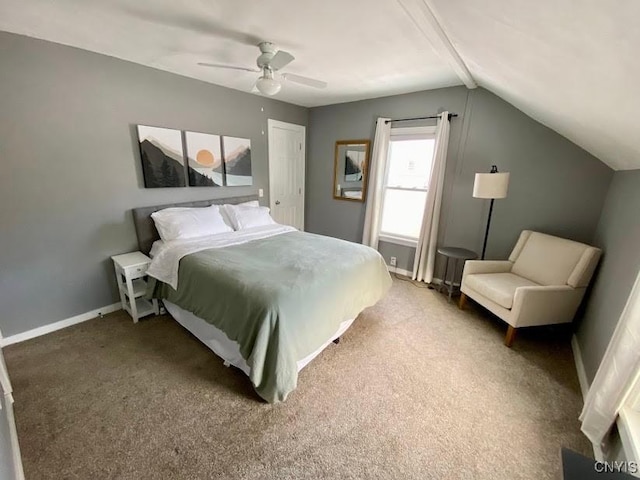 bedroom with carpet floors, vaulted ceiling, and ceiling fan