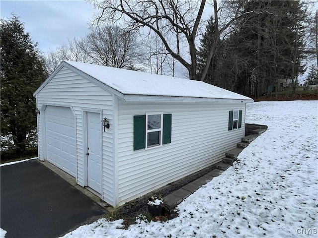 view of snow covered garage