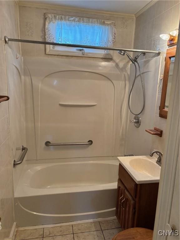 bathroom with tile patterned flooring, vanity, bathtub / shower combination, and ornamental molding