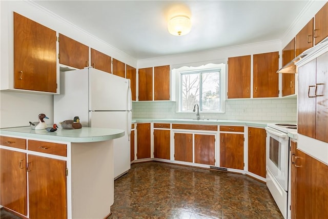 kitchen featuring white appliances, backsplash, ornamental molding, and sink