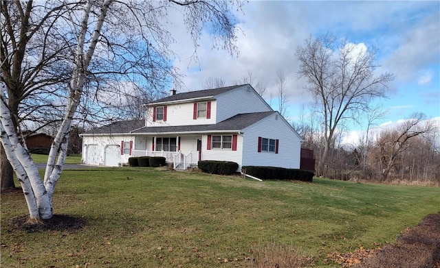 view of front of home featuring a front lawn and covered porch