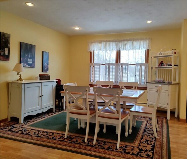 dining room featuring light hardwood / wood-style flooring