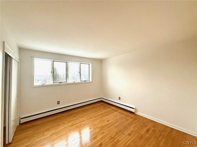 unfurnished room featuring light hardwood / wood-style flooring