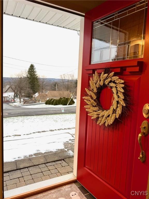 doorway to outside featuring plenty of natural light