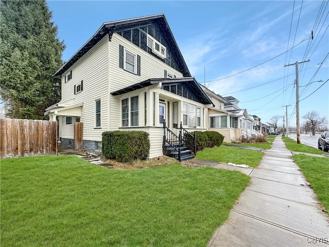 view of home's exterior featuring a yard