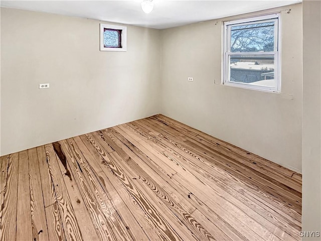 empty room featuring hardwood / wood-style flooring