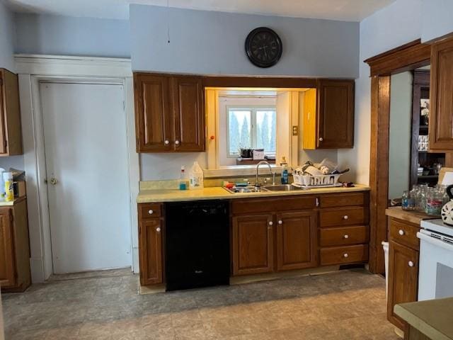 kitchen with electric range, a sink, light countertops, dishwasher, and brown cabinets