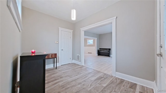 foyer with light hardwood / wood-style flooring