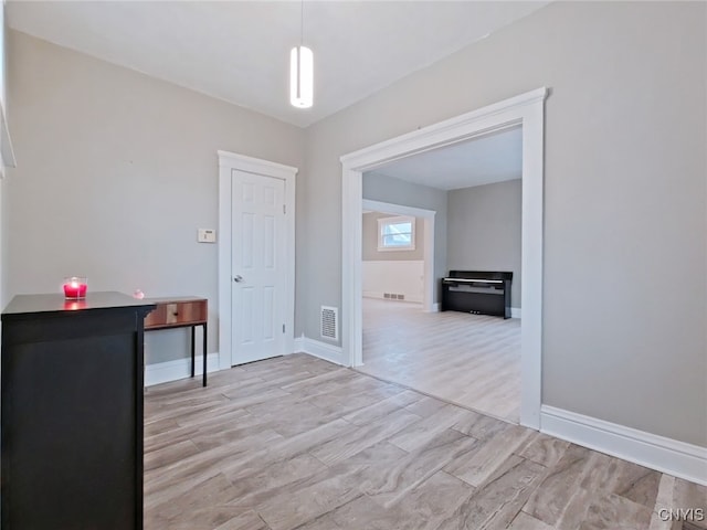 entrance foyer featuring light hardwood / wood-style floors