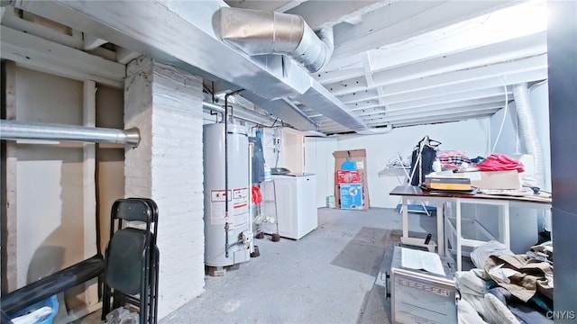 basement featuring washer / dryer and water heater