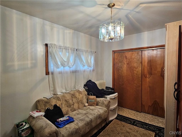 living room with a notable chandelier