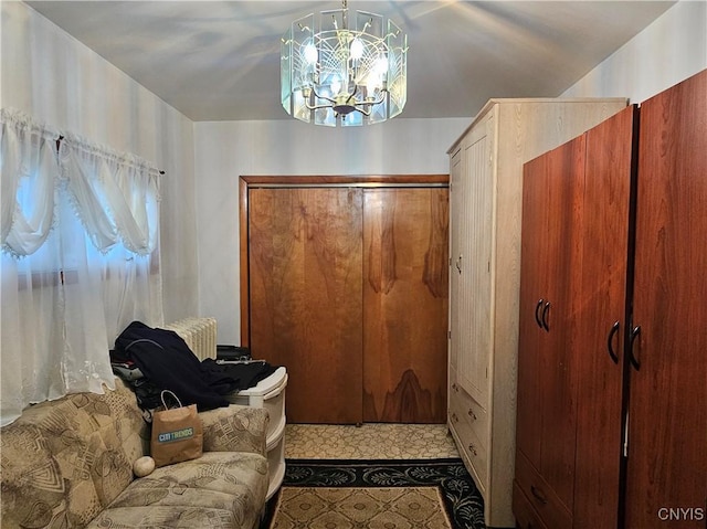 sitting room with a chandelier