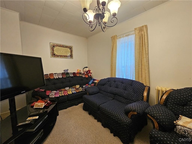 sitting room with carpet flooring and a notable chandelier