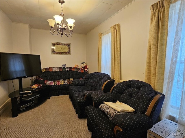 living room with a chandelier, carpet, and crown molding